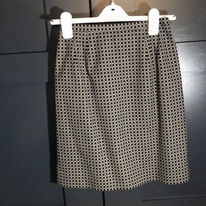 Black and white patterned knee length skirt petite